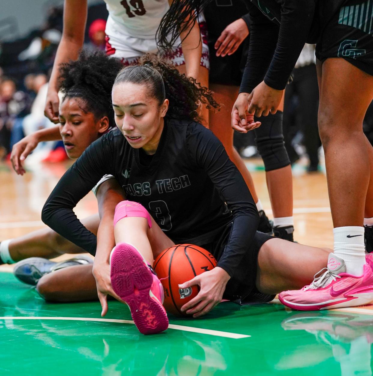 Detroit Renaissance's Anaya Hardy (2) fights for a loose ball with Detroit Cass Tech's Ari Parker (3) of the Detroit PSL basketball final at Wayne State Fieldhouse in Detroit on Sunday, Feb. 18, 2024.