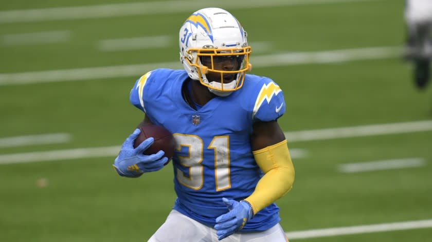 Chargers running back Kalen Ballage carries the ball against the New York Jets on Nov. 22, 2020, in Inglewood, Calif.