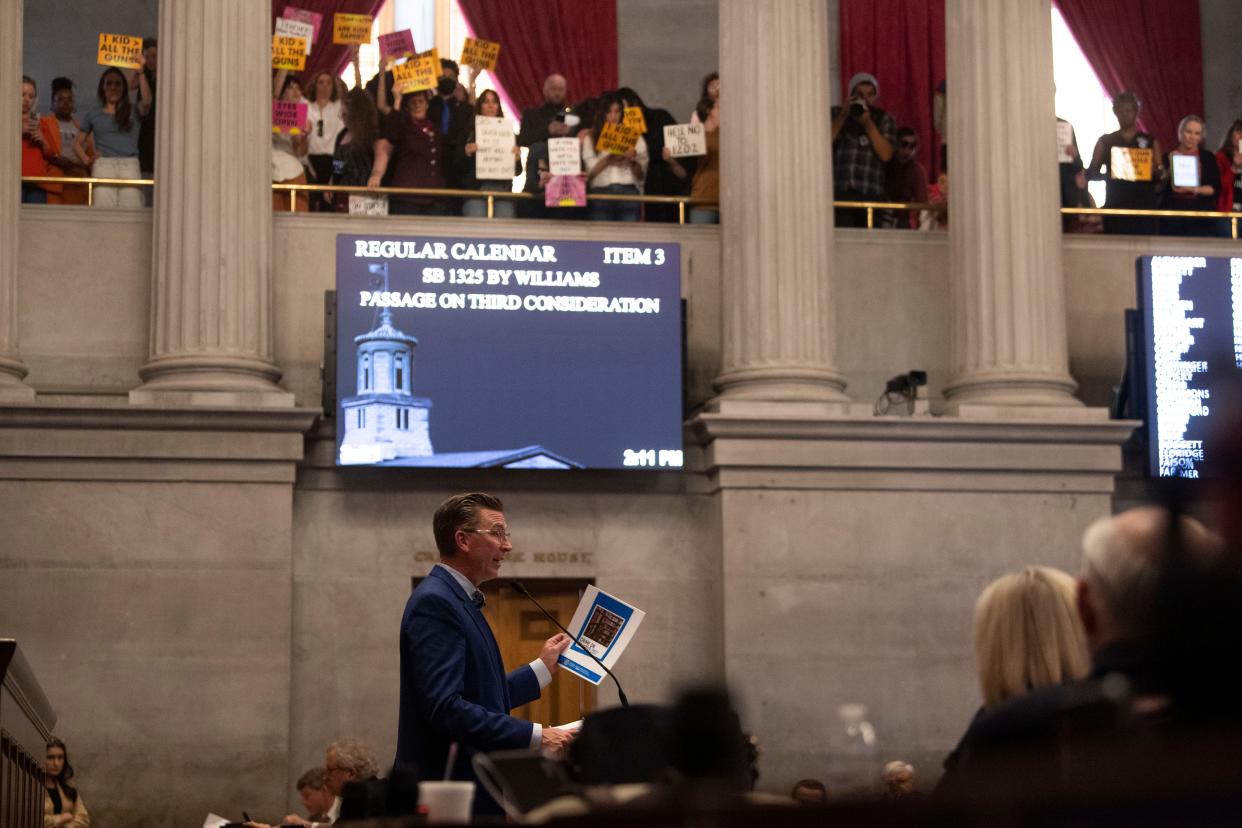 Rep. Ryan Williams, R-Cookeville, presents a bill that would allow K-12 public school teachers and staff to carry guns in schools on the Tennessee House floor on Tuesday.