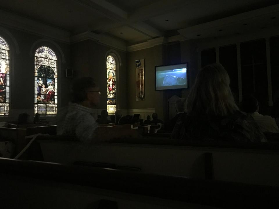 Guests watch "No Vacancy" at McKendree UMC in downtown Nashville.