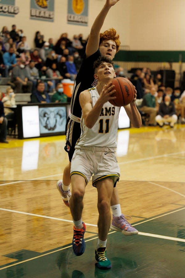 Flat Rock's Odin Nemeth goes in for a layup during a win over New Boston Huron Friday night.