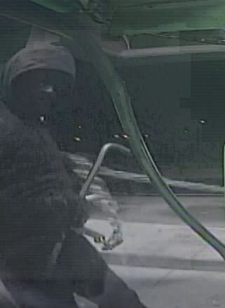 The St. Louis County Police Department released several photos Thursday of the wanted suspect during an apparent ATM heist earlier this week. (Courtesy: St. Louis County Police Department)