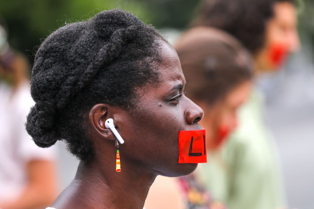 Protesters from both sides of the abortion debate wave competing scripture interpretations during a rally outside the U.S. Supreme Court in Washington, DC., United States on June 21, 2022. Photo by Yasin Ozturk/Anadolu Agency via Getty Images)