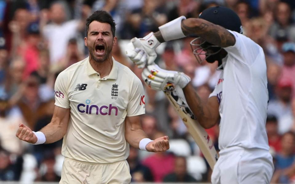 James Anderson roars with delight after taking the wicket of KL Rahul - AFP