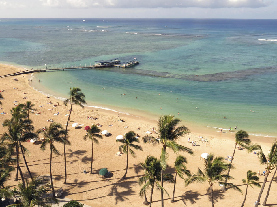 FILE - Duke Kahanamoku Beach, located in the Honolulu tourist neighborhood of Waikiki, Hawaii, is pictured on May 21, 2014. Duke Kahanamoku Beach has been ranked No. 2 on the list of the nation's best beach for 2023, according to the annual ranking released Thursday, May 18, 2023, by the university professor known as “Dr. Beach.” (AP Photo/Sam Eifling, File)