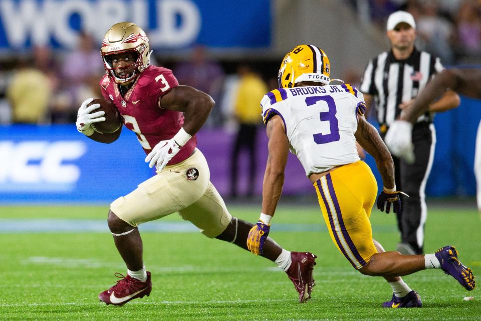 Florida State running back Trey Benson (3) makes his way toward the end zone during last weekend's game against the LSU Tigers.