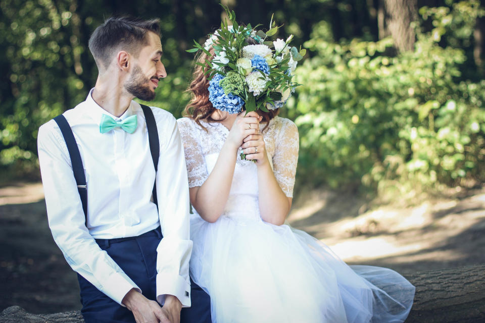 One bride and groom have posed for a seriously X-rated wedding photo [Photo: Pexels]