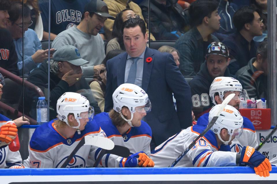 VANCOUVER, CANADA - NOVEMBER 06: Edmonton Oilers head coach Jay Woodcroft looks on during the second period of their NHL game against the Vancouver Canucks at Rogers Arena on November 6, 2023 in Vancouver, British Columbia, Canada. (Photo by Derek Cain/Getty Images)