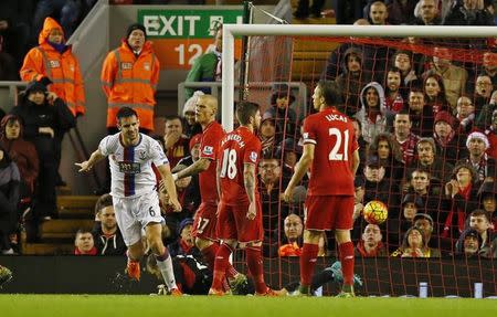 Football - Liverpool v Crystal Palace - Barclays Premier League - Anfield - 8/11/15 Crystal Palace's Scott Dann celebrates scoring their second goal as Liverpool players look dejected Reuters / Andrew Yates