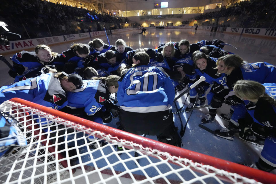 Toronto players take part in a huddle for their last home game before the PWHL hockey playoffs start as they play Ottawa in Toronto, Sunday May 5, 2024. (Frank Gunn/The Canadian Press via AP)