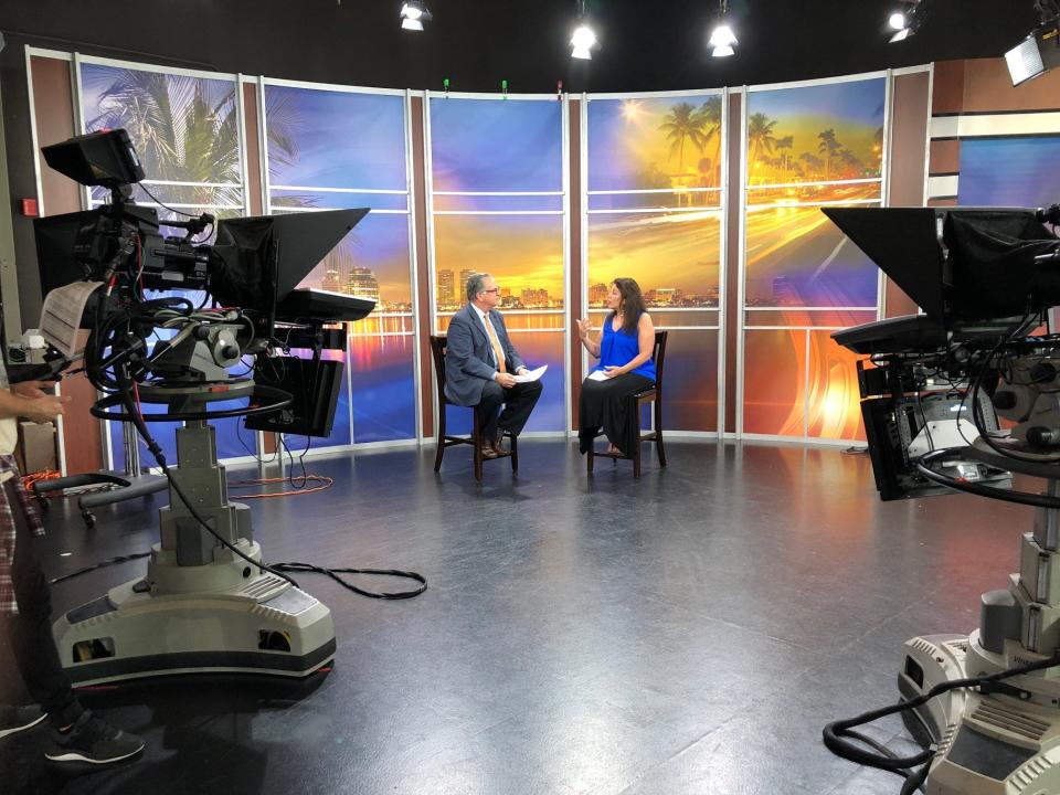 Kristen Bomas, right, shown in a session on WPTV, often speaks to local media as an expert in mental health.