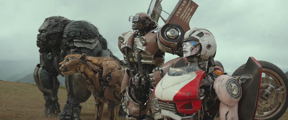 Maximals including Optimus Primal (voiced by Ron Perlman, far left) and Cheetor (Tongayi Chirisa) team up with Autobot heroes Wheeljack (Cristo Fernández) and Arcee (Liza Koshy) in "Transformers: Rise of the Beasts."