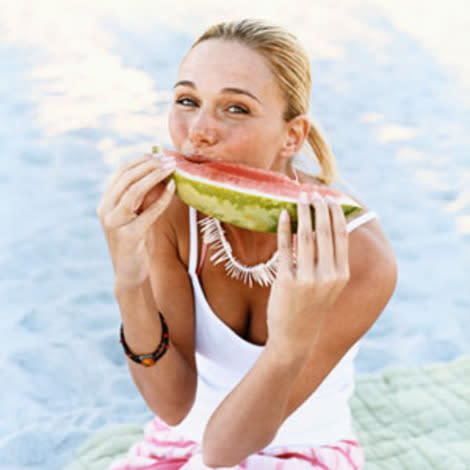 Woman eating watermelon