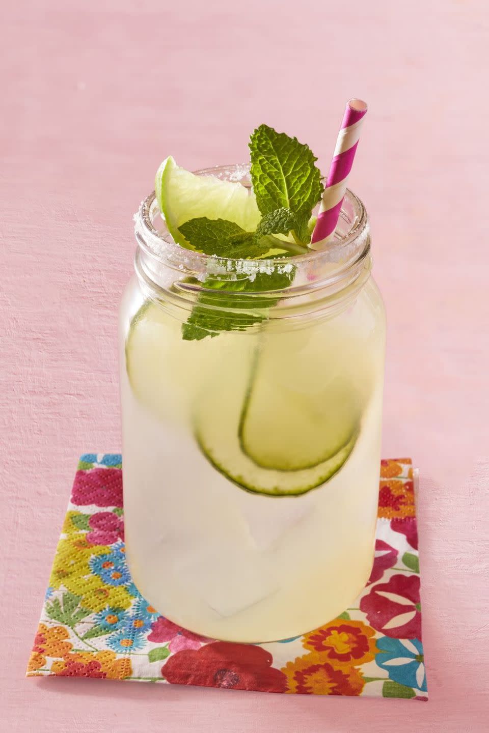 margarita in mason jar with pink straw