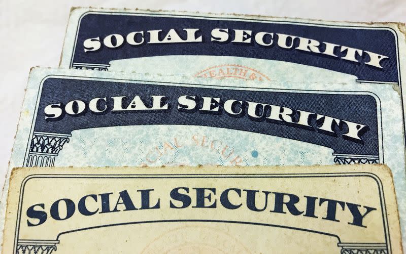 FILE PHOTO: U.S. Social Security card designs over the past several decades