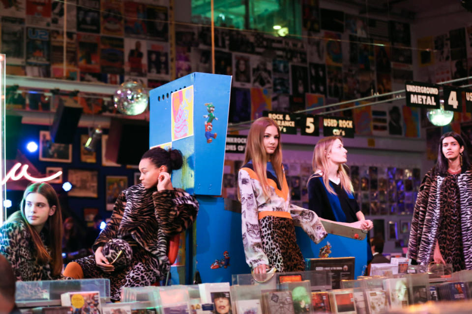 Models in Stella McCartney’s autumn 2016 collection at Amoeba Music in Los Angeles.