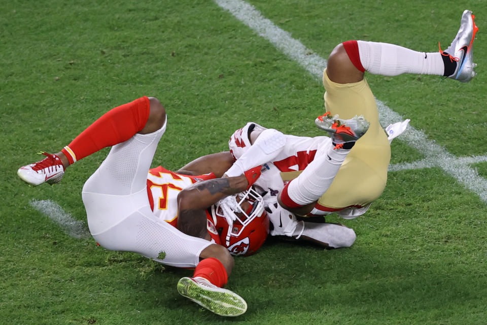 MIAMI, FLORIDA - FEBRUARY 02: Kendrick Bourne #84 of the San Francisco 49ers is tackled by Charvarius Ward #35 of the Kansas City Chiefs during the third quarter in Super Bowl LIV at Hard Rock Stadium on February 02, 2020 in Miami, Florida. (Photo by Elsa/Getty Images)