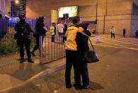 <p>Armed police stand guard at Manchester Arena after reports of an explosion at the venue during an Ariana Grande gig in Manchester, England Monday, May 22, 2017. Police says there are “a number of fatalities” after reports of an explosion at an Ariana Grande concert in northern England. (Peter Byrne/PA via AP) </p>