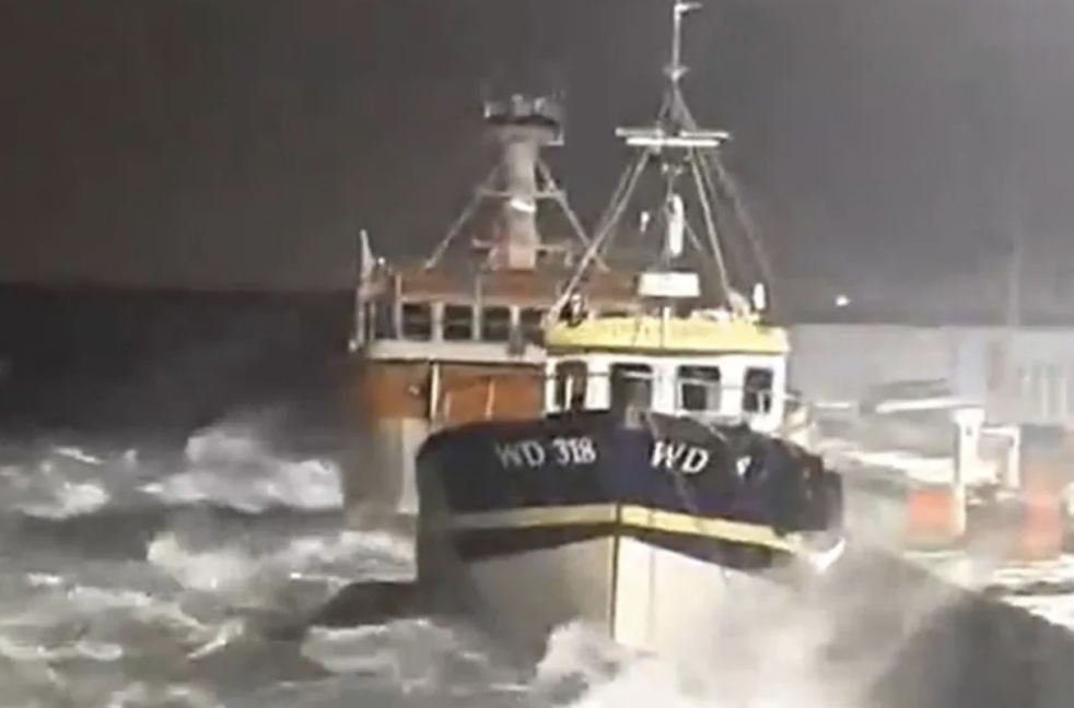 

Handout screengrab from video issued by Irish Coast Guard - Dun Laoghaire of the conditions as Storm Isha passes through Dun Laoghaire harbour on Sunday evening. (Image: PA)
