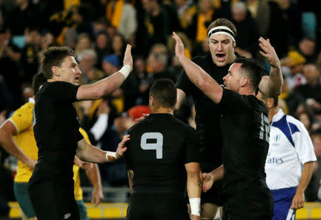 Australia Rugby Union - Bledisloe Cup - Australia's Wallabies v New Zealand All Blacks - Olympic Stadium, Sydney, Australia - 20/8/16 New Zealand's centre Ryan Crotty (R) celebrates with team mates after scoring a first try. REUTERS/Jason Reed
