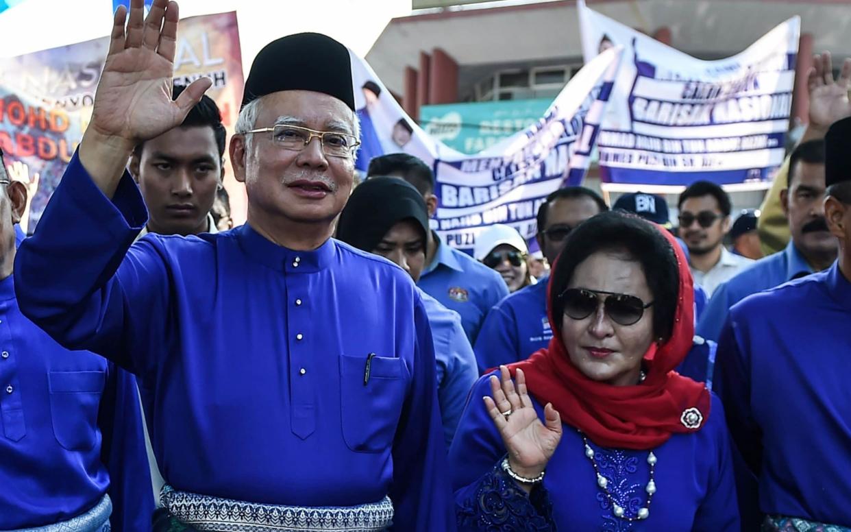 Former Malaysian Prime Minister Najib Razak and his wife Rosmah Mansor are facing a corruption probe - AFP