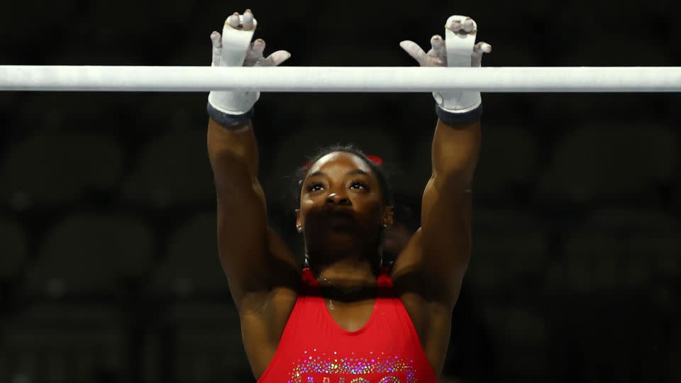 Simone Biles, photographed practicing this week, is set to compete for the first time since the Tokyo Olympics in July 2021. - Stacy Revere/Getty Images