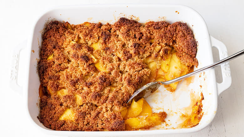 Peach crisp in baking dish