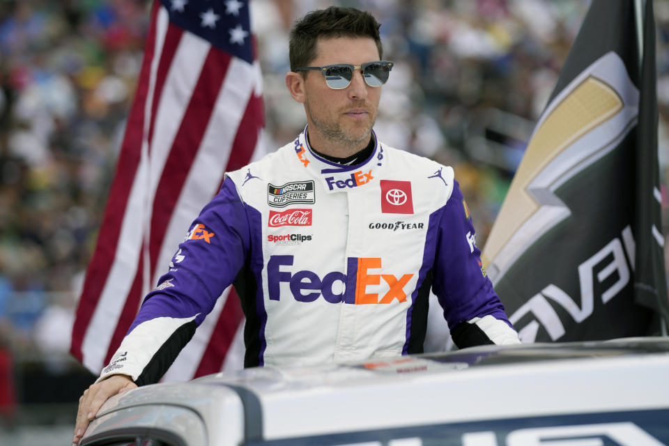 Denny Hamlin during driver introductions before the NASCAR Daytona 500 auto race at Daytona International Speedway, Sunday, Feb. 19, 2023, in Daytona Beach, Fla. (AP Photo/John Raoux)