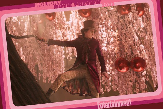 <p>Warner Bros. Pictures</p> Timothee Chalamet's Willy Wonka sings atop a chocolate tree in 'Wonka'