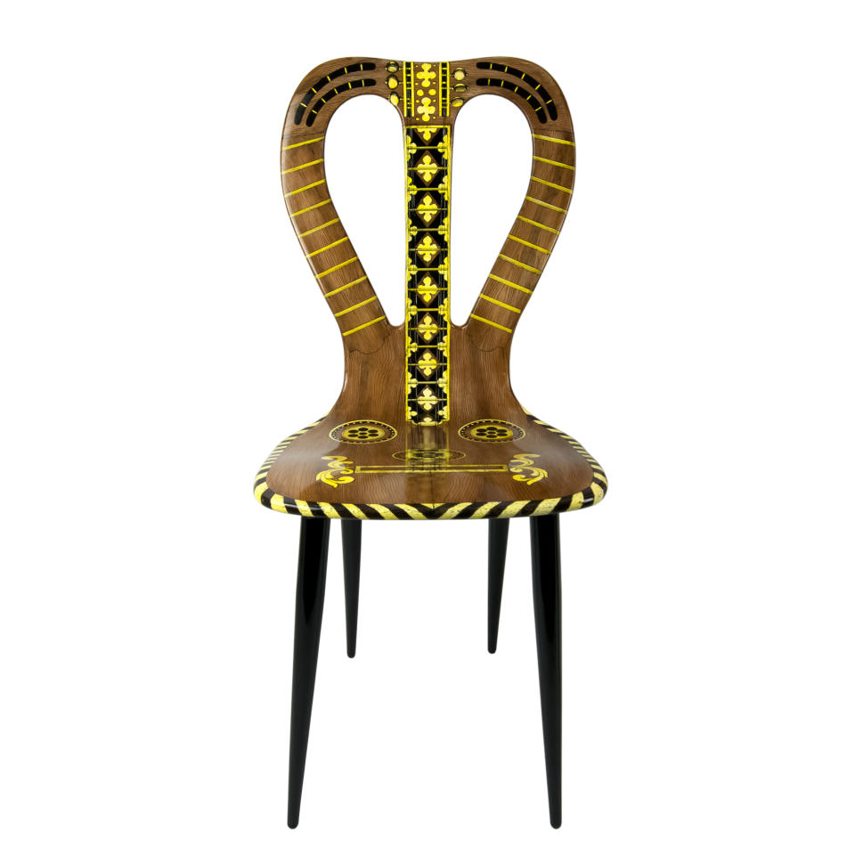 The "Strumenti musicali" chair, first realized by Piero Fornasetti in 1951.