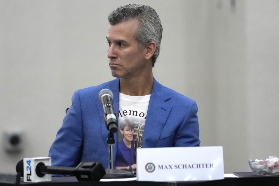 Max Schachter listens during a school safety roundtable Monday, Nov. 20, 2023, in Coral Springs, Fla. A Congressional delegation, family members and government officials toured Marjory Stoneman Douglas High School, where fourteen students and three staff members were fatally shot in 2018. Schachter's son Alex was killed in the shooting. (AP Photo/Lynne Sladky)