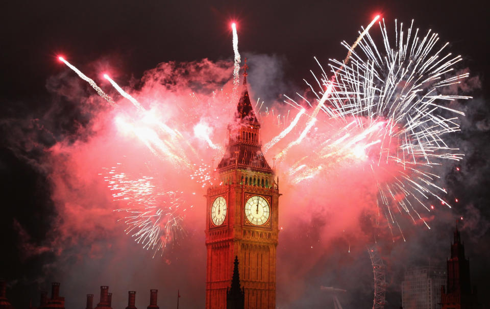 LONDON, ENGLAND - JANUARY 01: Fireworks light up the London skyline and Big Ben just after midnight on January 1, 2012 in London, England. Thousands of people lined the banks of the River Thames in central London to ring in the New Year with a spectacular fireworks display. (Photo by Dan Kitwood/Getty Images)