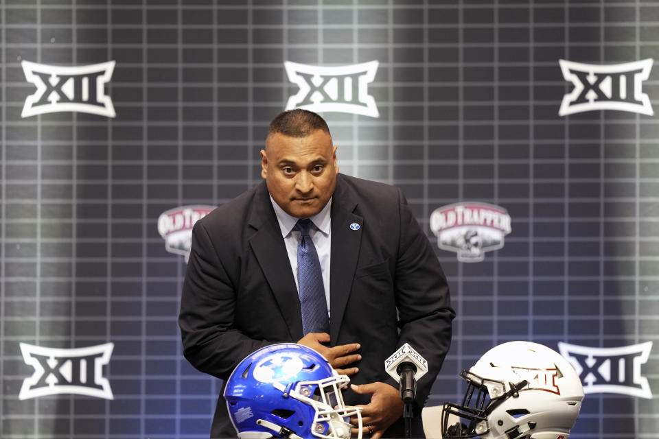 BYU coach Kalani Sitake sits before speaking at the Big 12 college football media days in Arlington, Texas, Wednesday, July 12, 2023. (AP Photo/LM Otero)