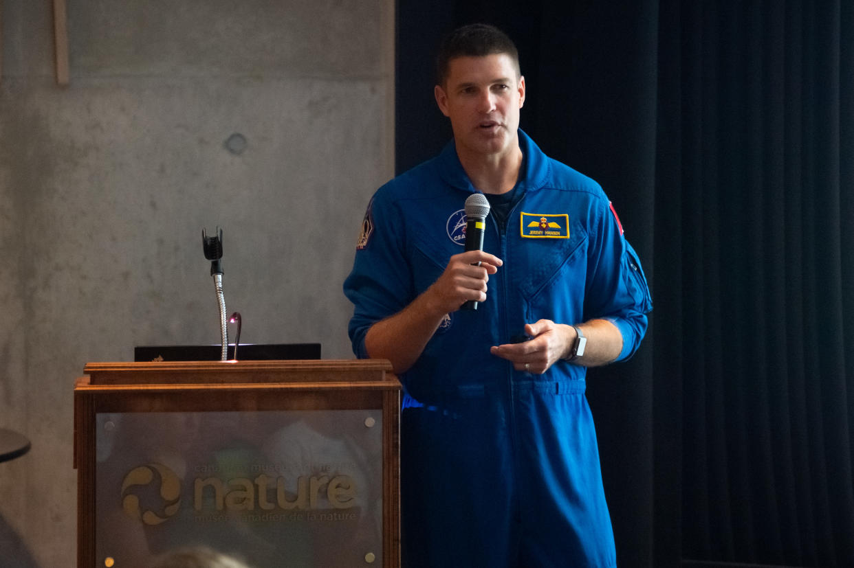  Canadian Space Agency astronaut and Artemis 2 crewmember Jeremy Hansen speaks at the Canadian Museum of Nature in Ottawa in July 2019 to celebrate the 50th anniversary of the Apollo 11 moon landing. 