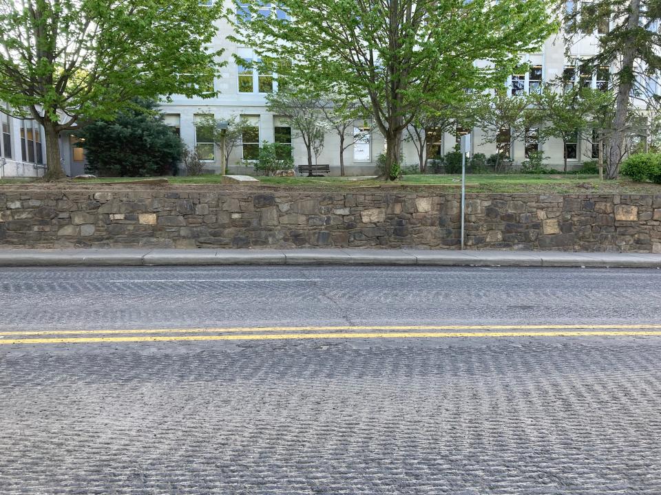 A view of the milled road on Merrimon Avenue outside of Claxton Elementary School on April 24, 2023.