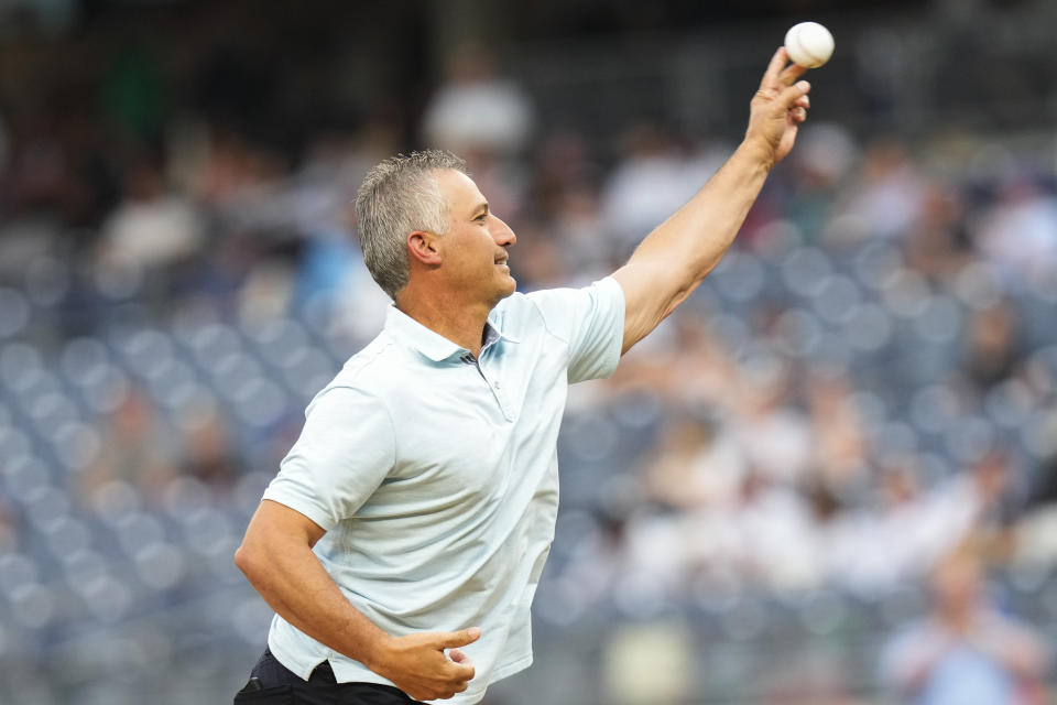 Former New York Yankees pitcher Andy Pettitte throws out a ceremonial first pitch before a baseball game between the Yankees and the New York Mets, Tuesday, July 25, 2023, in New York. (AP Photo/Frank Franklin II)