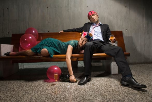 Exhausted drunk couple passed out from partying