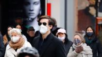 People wearing face masks are pictured at Schloss Strasse shopping street as the coronavirus disease (COVID-19) outbreak continues in Berlin