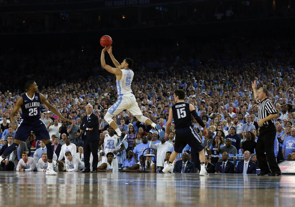 Apr 4, 2016; Houston, TX, USA; North Carolina Tar Heels guard Marcus Paige (5) hits a three point shot with 4.7 seconds over Villanova Wildcats guard <a class="link " href="https://sports.yahoo.com/nba/players/5695/" data-i13n="sec:content-canvas;subsec:anchor_text;elm:context_link" data-ylk="slk:Ryan Arcidiacono;sec:content-canvas;subsec:anchor_text;elm:context_link;itc:0">Ryan Arcidiacono</a> (15) in the championship game of the 2016 NCAA Men’s Final Four at NRG Stadium. Mandatory Credit: Bob Donnan-USA TODAY Sports