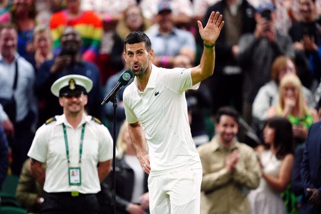 Novak Djokovic sarcastically waves at the crowd