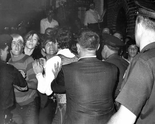 PHOTO: Crowd attempts to impede police arrests outside the Stonewall Inn on Christopher Street in Greenwich Village. (New York Daily News Archive/NY Daily News via Getty Images)