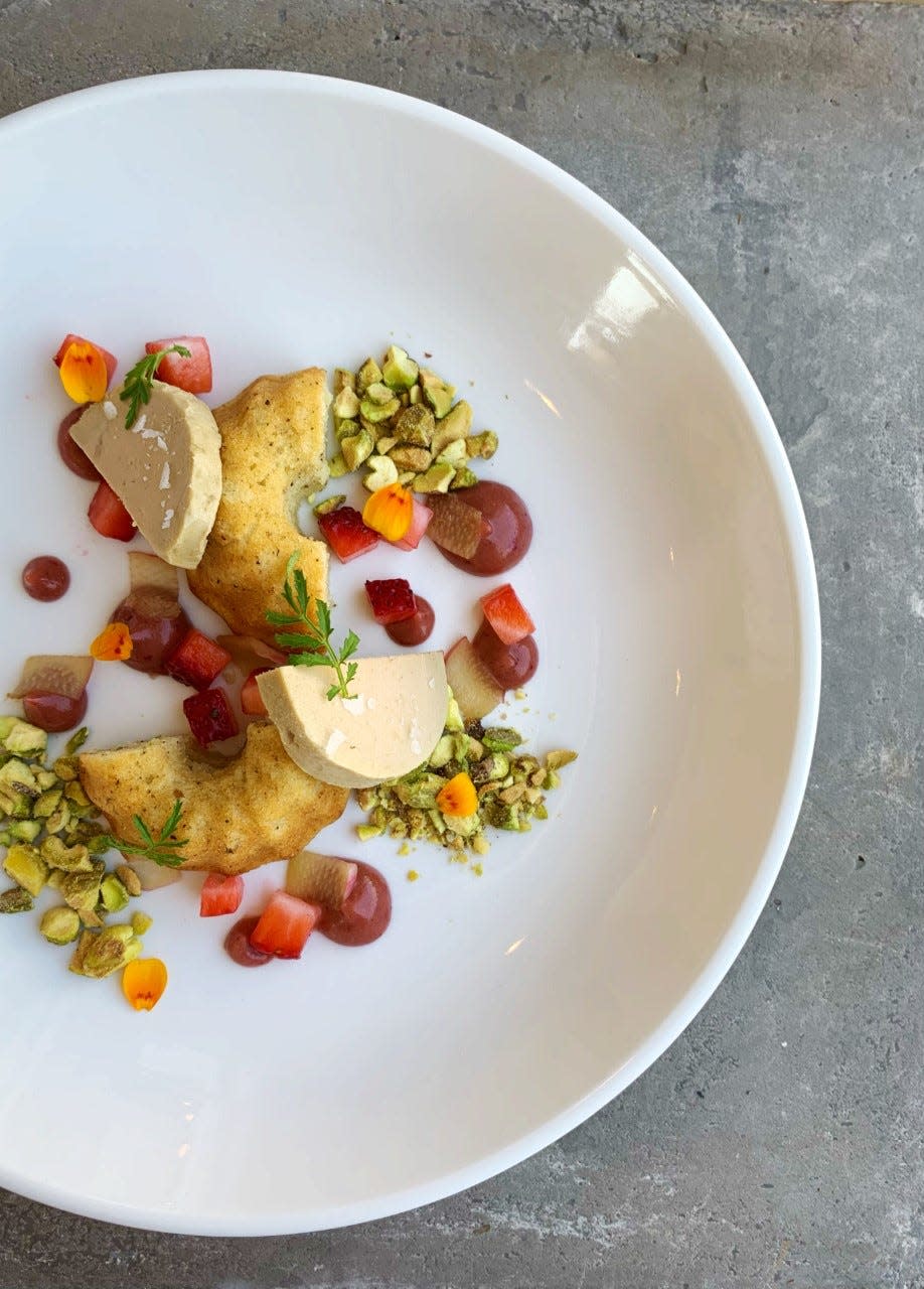 Heirloom's summer menu features a Hudson Valley torchon of foie gras.