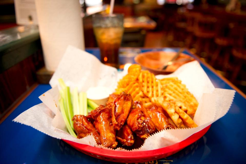 Enjoy a basket of wings and waffle fries while watching the Super Bowl at Lefty's Wings & Grill.