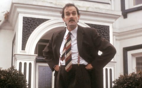 Hopeless: John Cleese as Basil Fawlty in Fawlty Towers - Credit: BBC