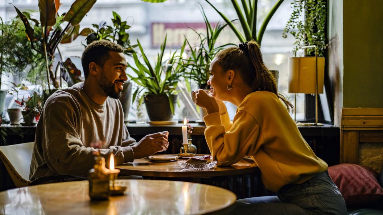 couple on a weekend date at cute cafe