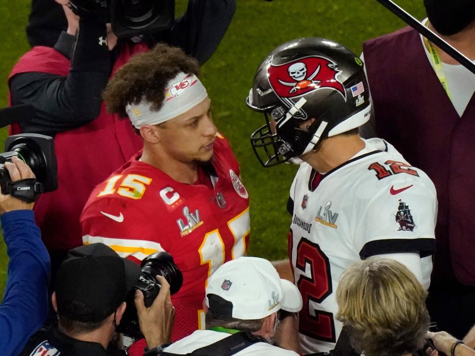 Patrick Mahomes speaks with Tom Brady after Super Bowl LV.