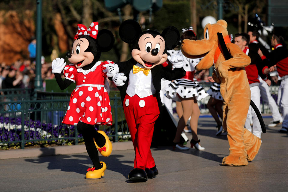 FILE PHOTO: Disney characters Mickey Mouse and Minnie Mouse attend the 25th anniversary of Disneyland Paris at the park in Marne-la-Vallee, near Paris, France, April 12, 2017. REUTERS/Benoit Tessier/File Photo GLOBAL BUSINESS WEEK AHEAD – SEARCH GLOBAL BUSINESS 8 MAY FOR ALL IMAGES