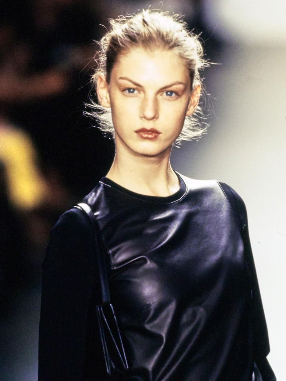 From a fresh-faced Kate Moss on the Spring 1994 runway to a subtle speck of silver in Fall 2017, less-is-more beauty has long reigned at Calvin Klein.