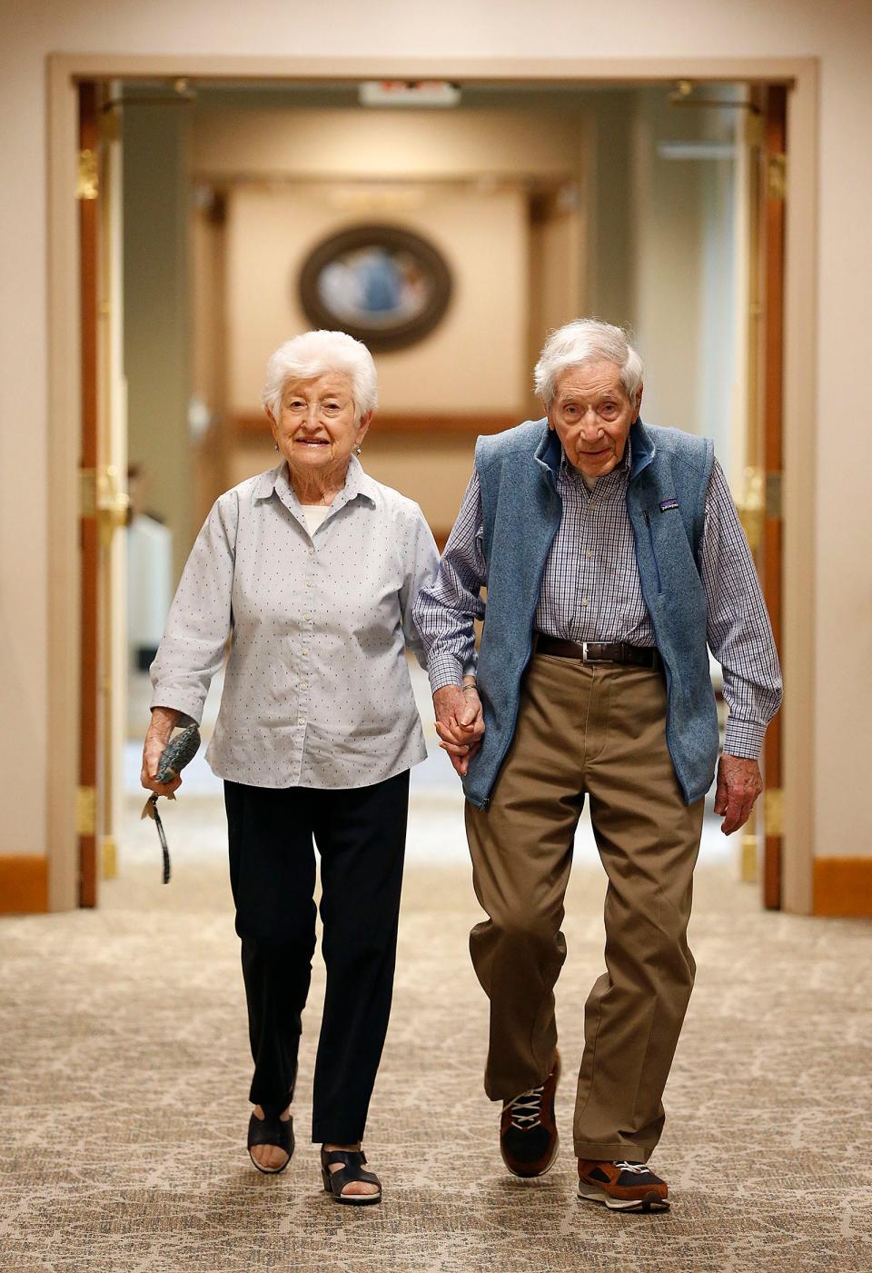 Arlene and Arthur Constant, formerly of Quincy, now live at Linden Ponds in Hingham and have been married for 70 years. They spend time each day walking inside or out. Tuesday, Oct. 26, 2021.