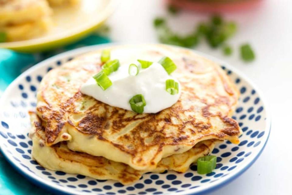 Eazy Peazy Mealz<p>Savory bacon, chive, and cheddar cheese ricotta pancakes make a great savory start to the day!</p><p><strong>Get the recipe: <a href="https://www.eazypeazymealz.com/savory-bacon-cheddar-chive-ricotta-pancakes/" rel="sponsored" target="_blank" data-ylk="slk:Savory Bacon Chive and Cheddar Ricotta Pancakes;elm:context_link;itc:0;sec:content-canvas" class="link "><em>Savory Bacon Chive and Cheddar Ricotta Pancakes</em></a></strong></p><p><strong>Related: <a href="https://www.yahoo.com/lifestyle/10-brilliant-recipes-ice-cube-213415501.html" data-ylk="slk:Ice-Cube Tray Recipes For Pancakes and More;elm:context_link;itc:0;sec:content-canvas;outcm:mb_qualified_link;_E:mb_qualified_link;ct:story;" class="link  yahoo-link">Ice-Cube Tray Recipes For Pancakes and More</a></strong></p>